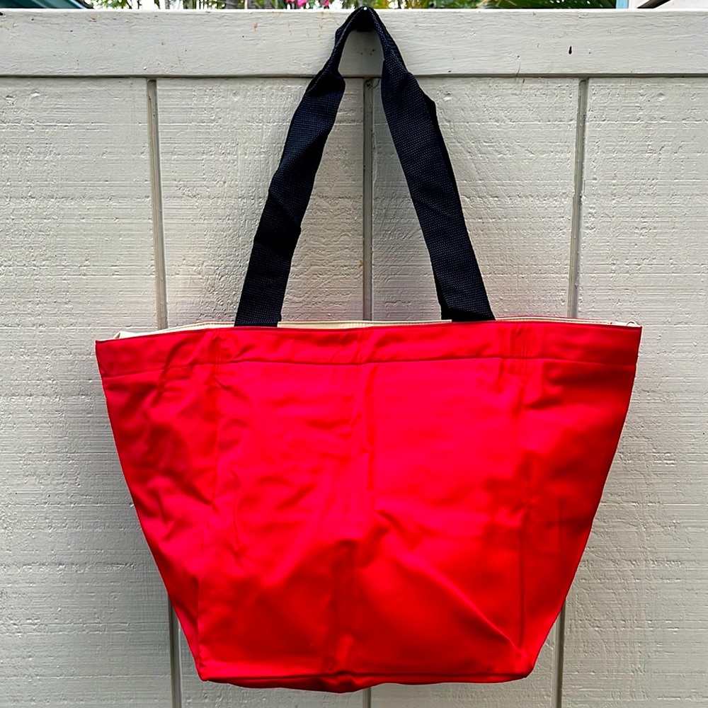 Medium red tote bag with small cosmetic bag